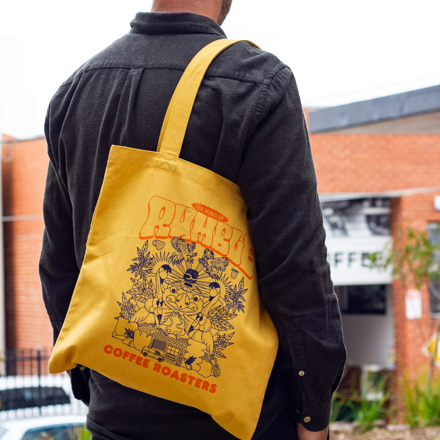 10 Years of Rumble Mustard Tote Bag